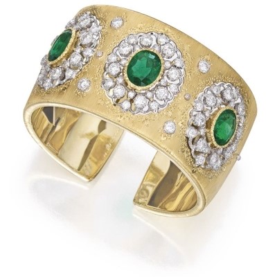 Bracciale rigido bicolore in oro, smeraldi e diamanti